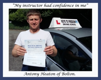 Antony Heaton of Bolton, posing by the car with his pass certificate, after his first time pass. With Keys to Freedom Driving School.